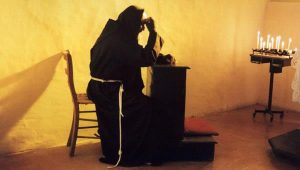 Padre Pio em oração